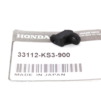 HONDA PIASTRINA FISSAGGIO FARO A PER CRM125-NSR125F RAIDEN 33112-KS3-900 | Mamoto Ricambi